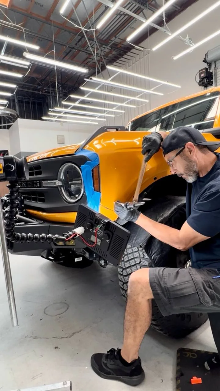 Paintless dent repair on a Ford Bronco at Dent Evo, Upland California
